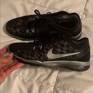 Black and silver Nike free 5.0